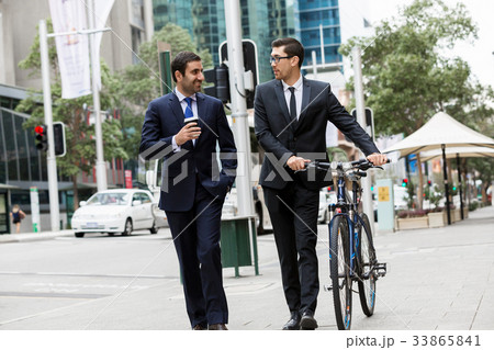 Young businessmen with a bike 33865841