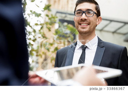 Portrait of handsome businessman outdoor Portrait of handsome businessman outdoor 33866367