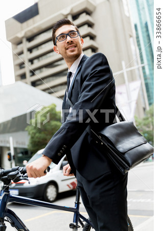 Young businessmen with a bike 33866654