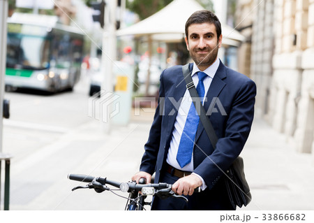 Young businessmen with a bike 33866682