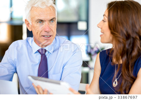 Business people having meeting 33867697
