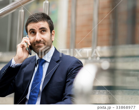 Portrait of handsome businessman outdoor 33868977