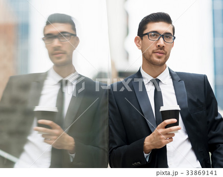 Portrait of handsome businessman outdoor Portrait of handsome businessman outdoor 33869141