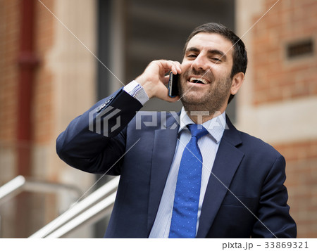 Portrait of handsome businessman outdoor Portrait of handsome businessman outdoor 33869321