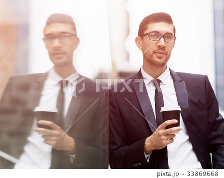Portrait of handsome businessman outdoor 33869668