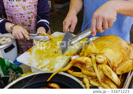 Street foods at local market in Hong Kong 33871225