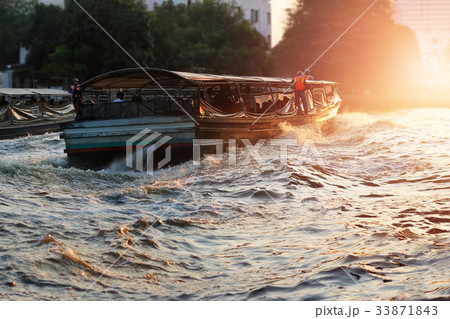 transportation taxi boat in river city on sunset transportation taxi boat in river city on sunset 33871843