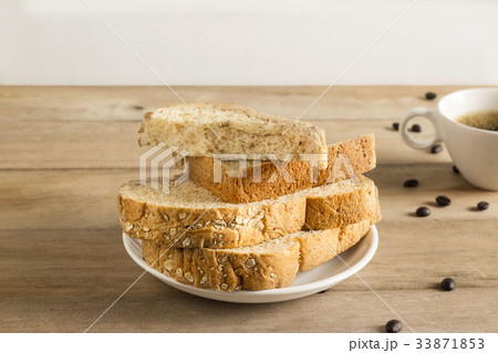 bread with white sesame, coffee beans, coffee cup bread with white sesame, coffee beans, coffee cup 33871853