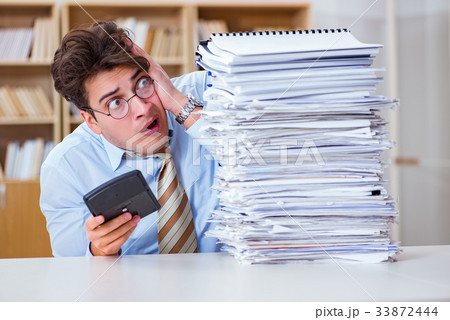 Funny accountant bookkeeper working in the office 33872444