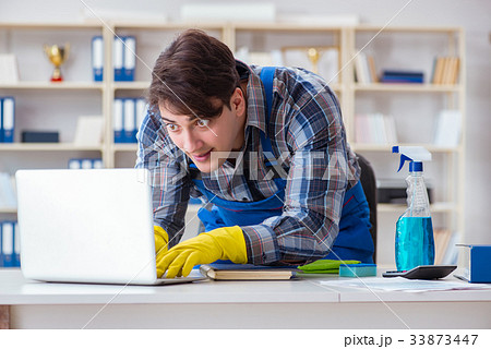 Hacker under cleaner cover stealing personal data Hacker under cleaner cover stealing personal data 33873447