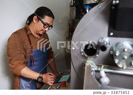 Working at coffee roastery 33875852