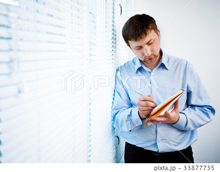 businessman at work businessman at work 33877735