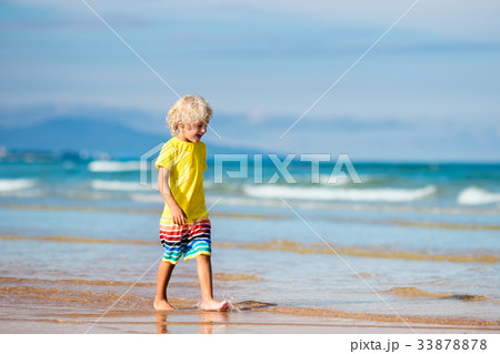 Child on tropical beach. Sea vacation with kids. Child on tropical beach. Sea vacation with kids. 33878878