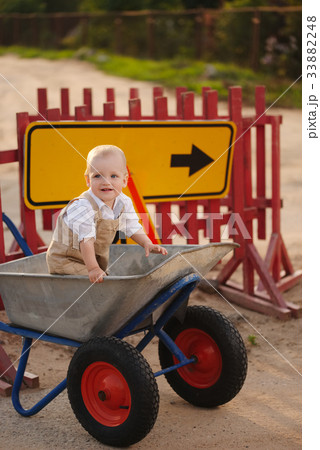 little boy on the repaired road 33882248