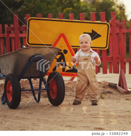 little boy on the repaired road 33882249