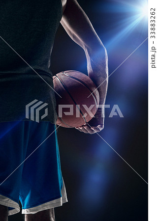 The portrait of a basketball player with ball 33883262