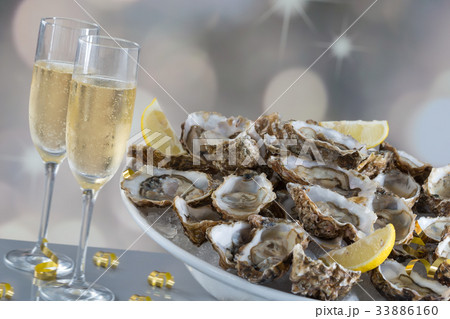 Fresh oysters with glass of champaigne 33886160