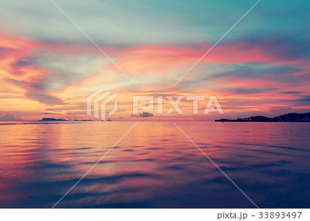 Sunset dramatic colorful tropical sea sky  33893497