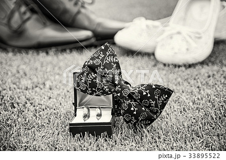 Wedding rings, bow tie and women's and men's shoes 33895522