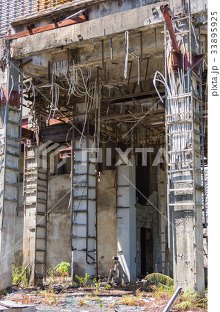 Ruins of an abandoned hotel destroyed by marauders 33895925