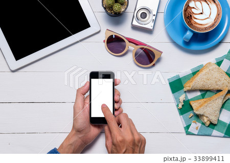 Man hands holding smartphone Man hands holding smartphone 33899411