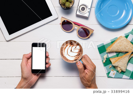 Man using smart phone Man using smart phone 33899416