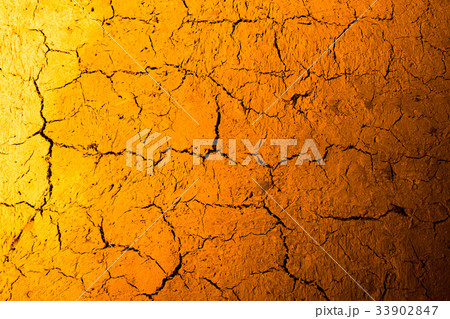 Clay wall in golden light as background 33902847