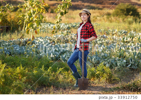 woman gardener with spade woman gardener with spade 33912750
