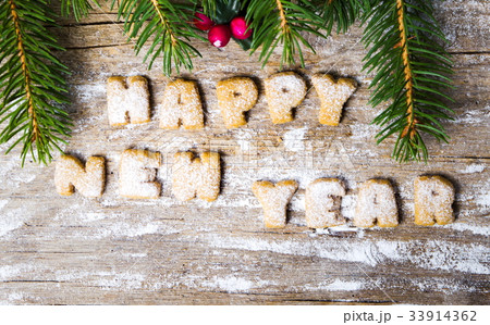 Happy new year note written with cookies 33914362