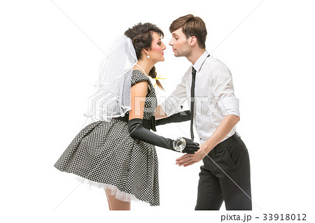 boy and girl looking like dolls 33918012