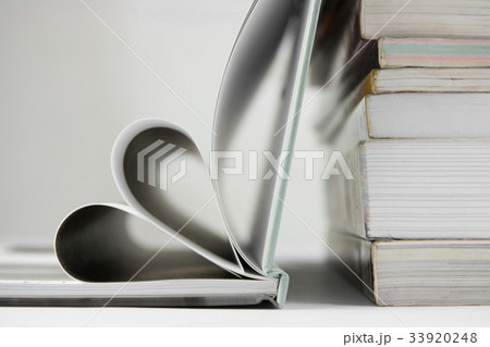 Composition with book heart on the table 33920248