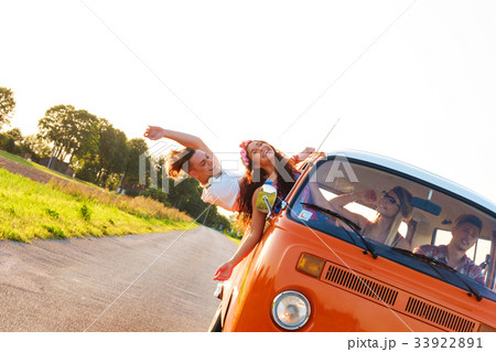 Hippie friends in a van on a road trip Hippie friends in a van on a road trip 33922891
