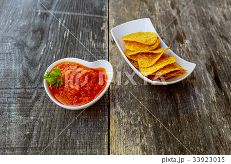 corn chipswith spicy adjika salsa corn chipswith spicy adjika salsa 33923015