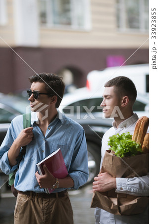 Stylish young men shopping. Hipster youth Stylish young men shopping. Hipster youth 33923855