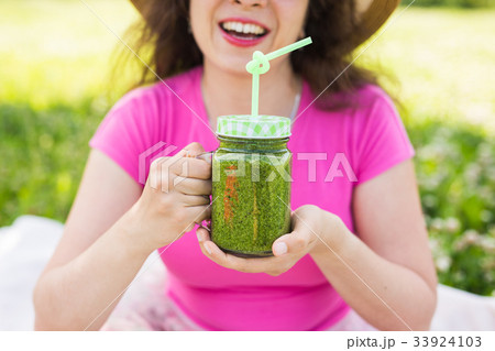 Close up of Young woman have fun in the park and 33924103