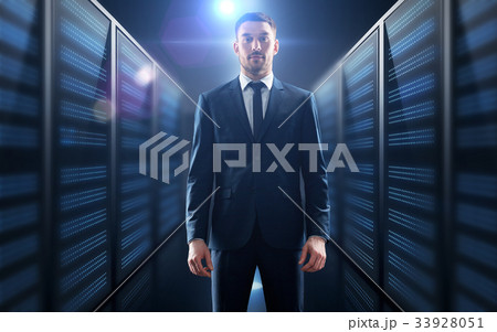 businessman over server room background 33928051