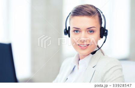 female helpline operator with headphones female helpline operator with headphones 33928547