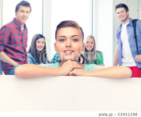 woman with white blank board at school woman with white blank board at school 33931298