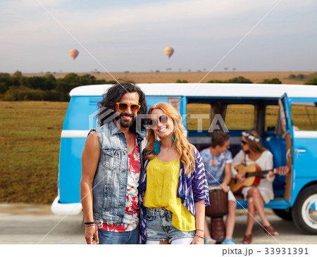 happy hippie couples and minivan in africa 33931391