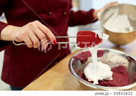 chef making macaron batter at kitchen chef making macaron batter at kitchen 33931632