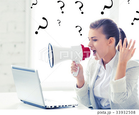 strict businesswoman shouting in megaphone strict businesswoman shouting in megaphone 33932508