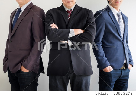 Group of business people with businessman leader standing with a 33935278