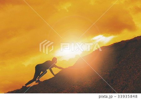 A silhouette of man climbing on stone, mountain at sunset. 33935848