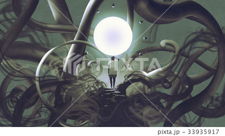 man standing in abstract place with glowing circle 33935917