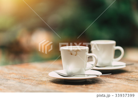two cup of espresso on wood table 33937399