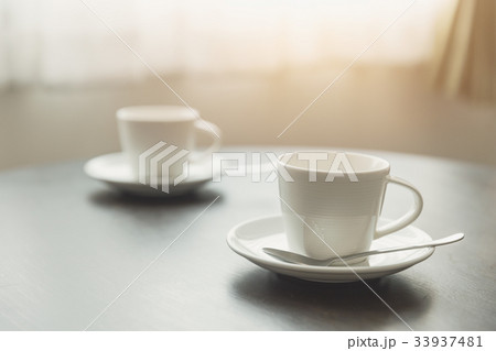 two cup of coffee on wood table meeting concept two cup of coffee on wood table meeting concept 33937481