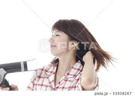 寝ぐせ直しの女性 寝ぐせ直しの女性 33938267