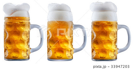 Mug of frosty beer with foam Mug of frosty beer with foam 33947203