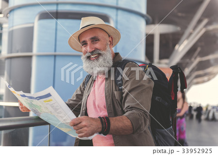 Hilarious smiling old man ready for journey 33952925