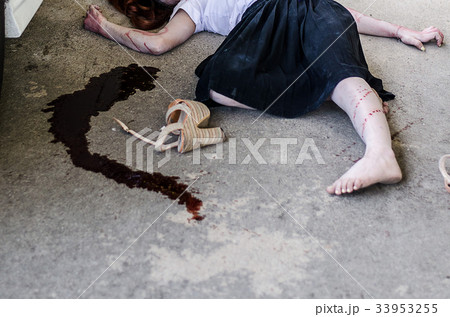 Car Accident .Dead woman lying on a street 33953255